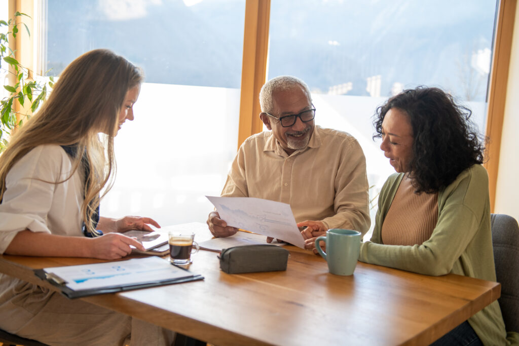 Insurance agent at home consultation with elderly people